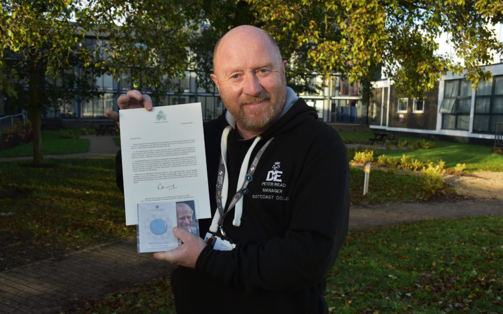 Peter Read Peter Read with his special commemorative coin and letter of commendation from HRH the Earl of Wessex. Photo East Coast College.