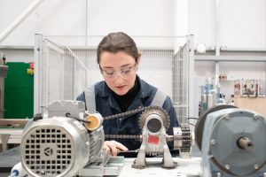 A female student studying engineering at East Coast College. 